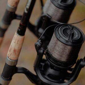 Detailed view of fishing rods and reels, showcasing craftsmanship and quality gear.