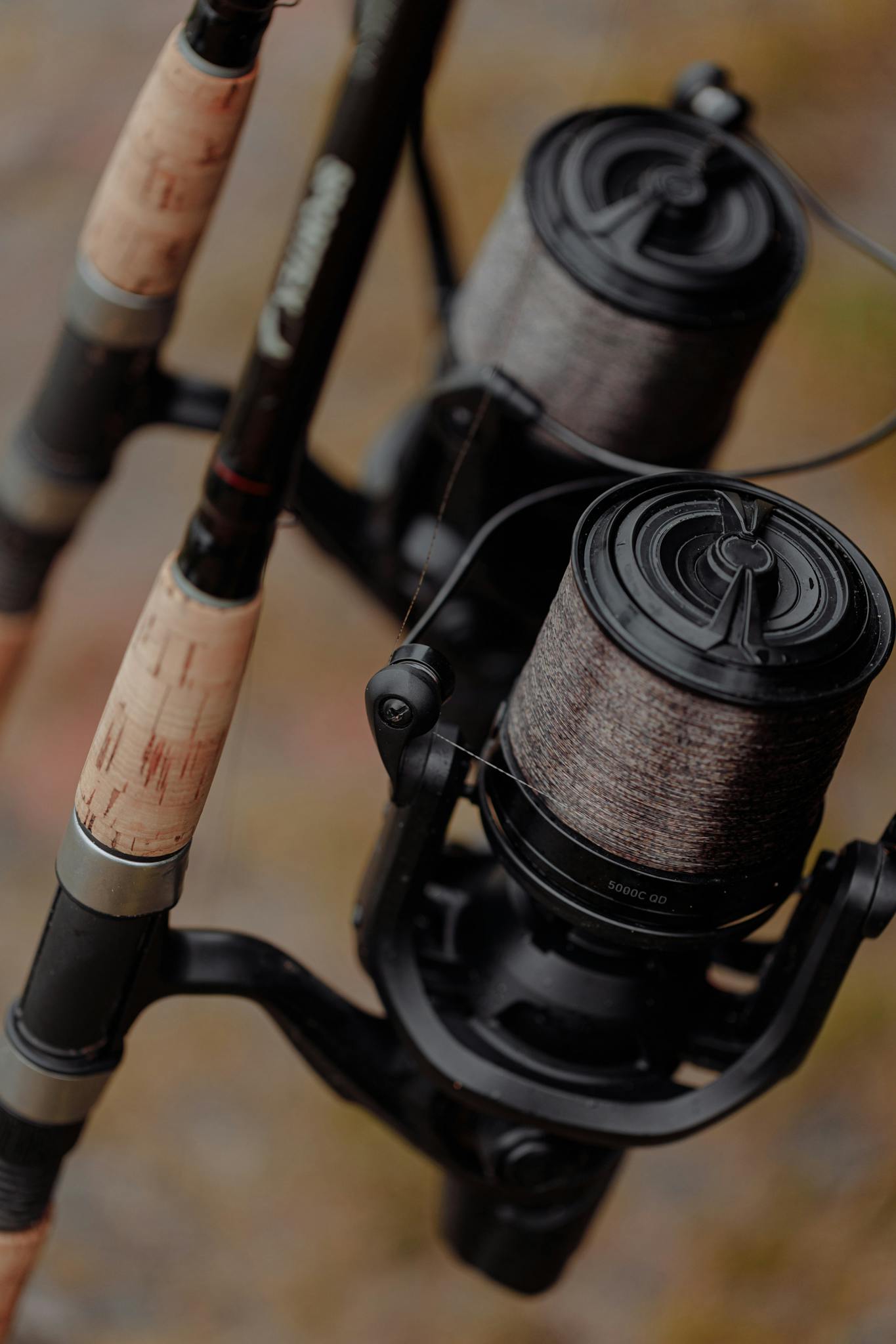 Detailed view of fishing rods and reels, showcasing craftsmanship and quality gear.